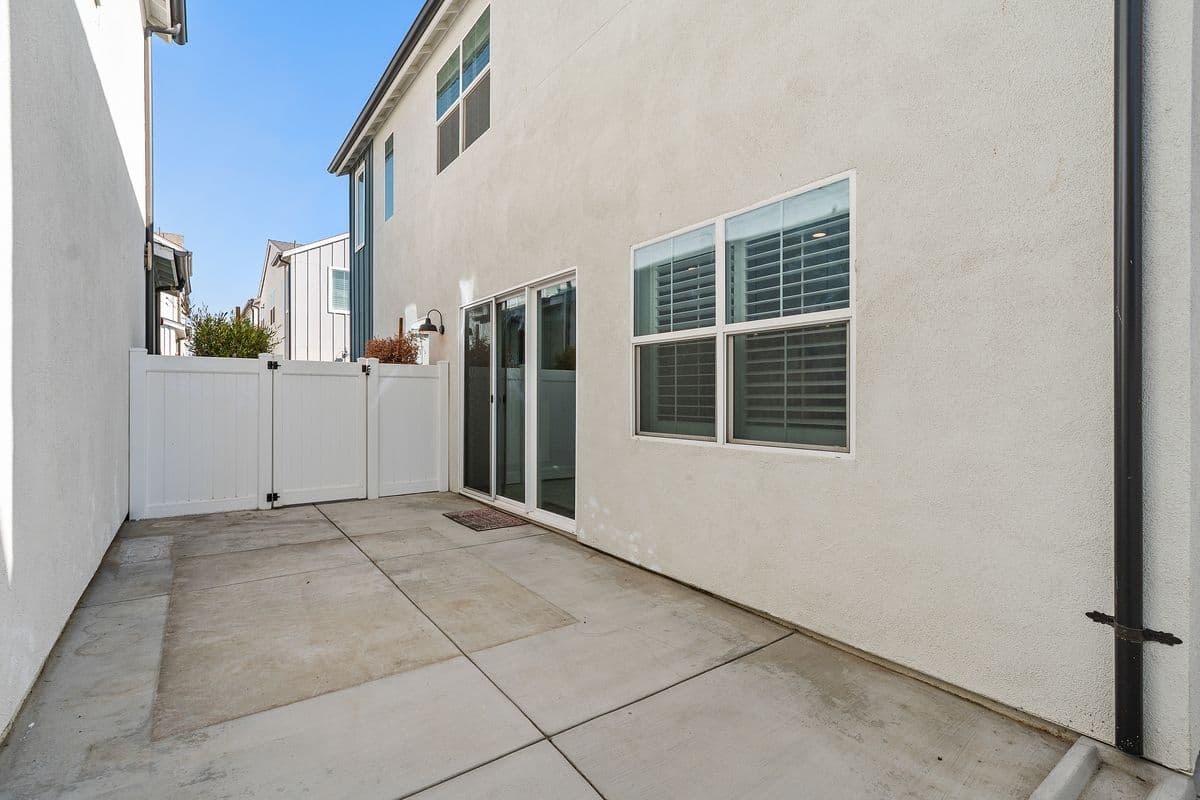 Your Private Patio from back corner. Front Gate in back, Glass Slider Door to Main Living Space.