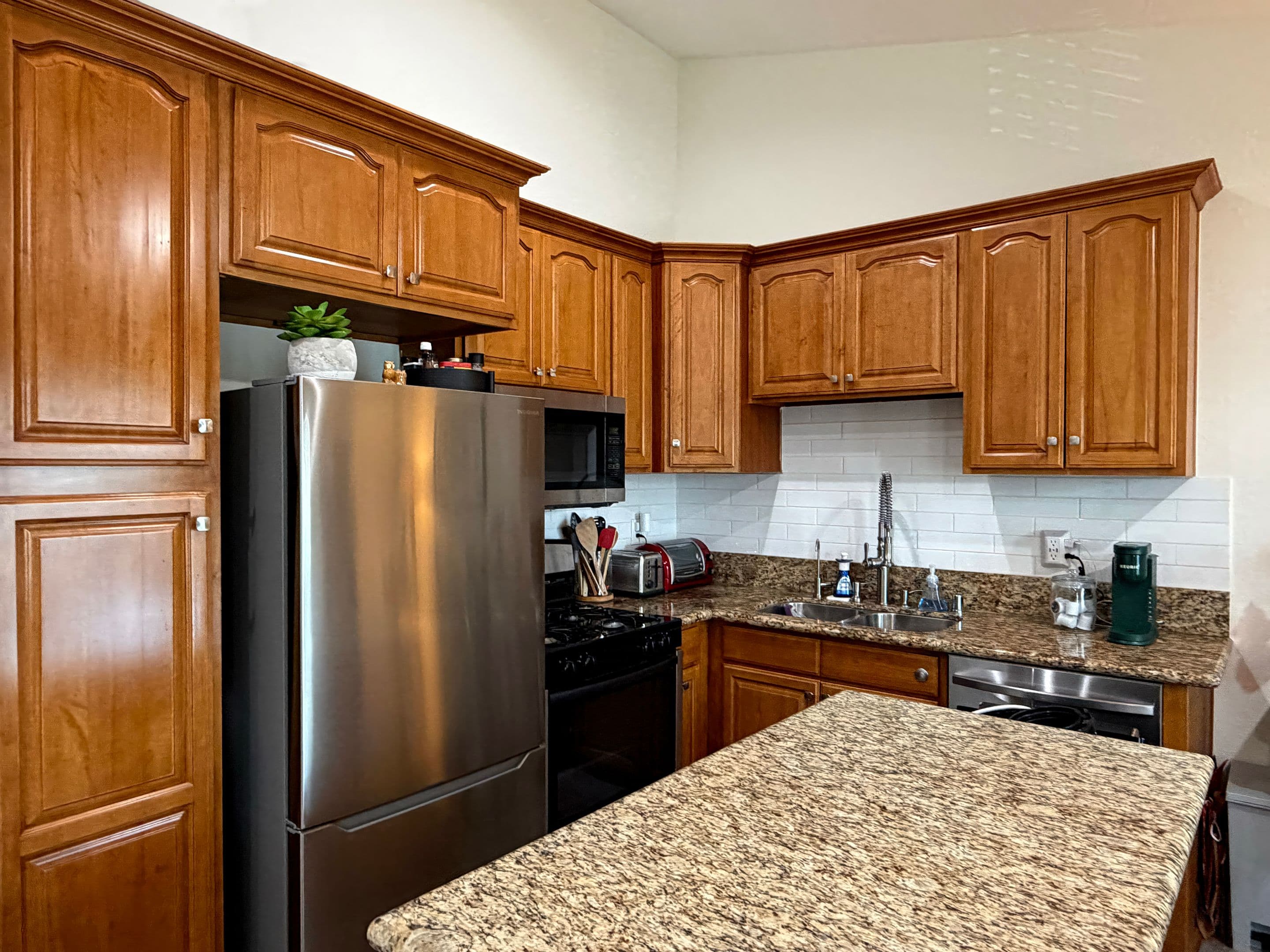 Kitchen with granite counters and center island